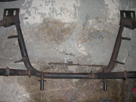1988 Ford Bronco - Exhaust pipe assembly shown from below, with visible rust and wear on the metal components.