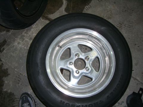 1988 Ford Bronco - Close-up of a custom aluminum wheel and tire, likely for a car or truck.