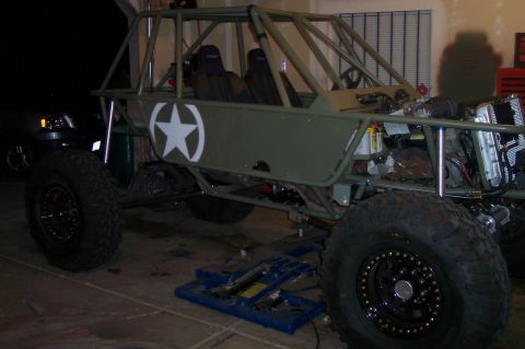 1995 Ford Bronco - Custom-built buggy features a roll cage, military-style star decal, and heavy-duty off-road tires.