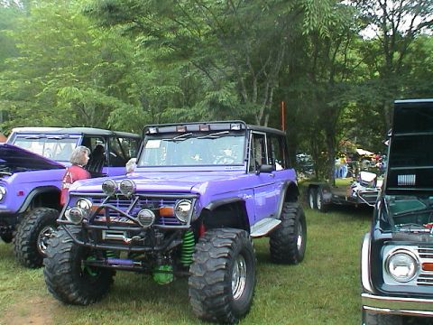 1972 Ford Bronco - Modified 1972 Ford Bronco at an outdoor event, parked next to another vehicle.