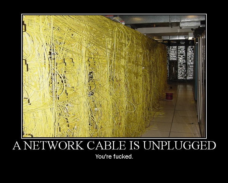 Meme poster of a server room wall covered in tangled yellow network cables