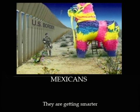 2006 Ford E350 - A colorful piñata is placed near the U.S. border fence, suggesting a creative approach to crossing.