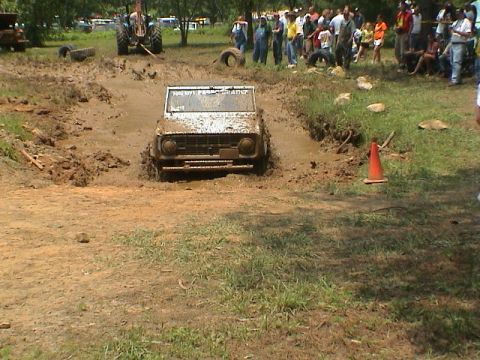 1972 Ford Bronco - Mud bogging event with a 1972 Ford Bronco stuck in the mire.