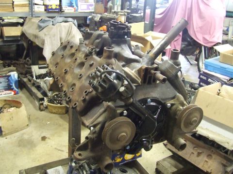 1967 Ford Bronco - Ford flathead V8 engine block with distributor and water pump visible.