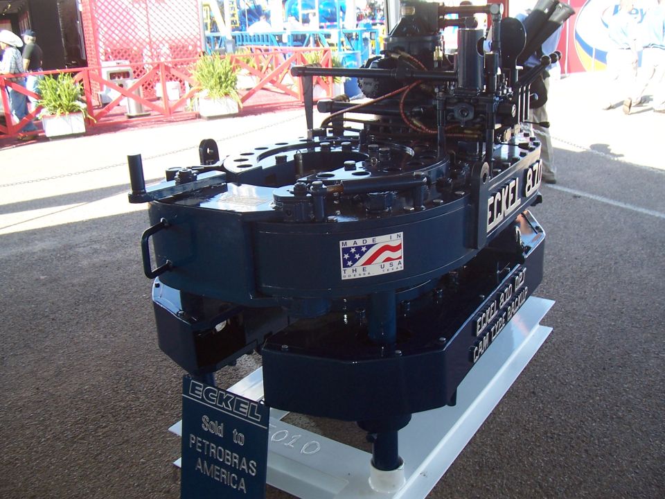 Blue industrial machine with ECKEL 870 BADGE and "Made in the USA" sticker