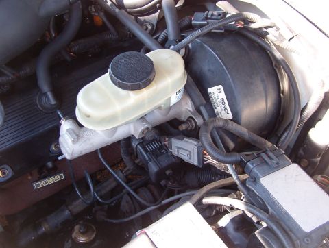 1998 Mercury Grand Marquis - The booster goes with the brake pedal, so this is also getting swapped.