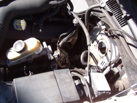 1998 Mercury Grand Marquis - The MC can stay attached to its lines. I hooked it on the dipstick handle to keep it out of the way.