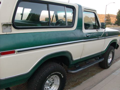 1978 Ford Bronco - This 1978 Ford Bronco is shown from the side, a two-tone paint scheme and chrome accents.
