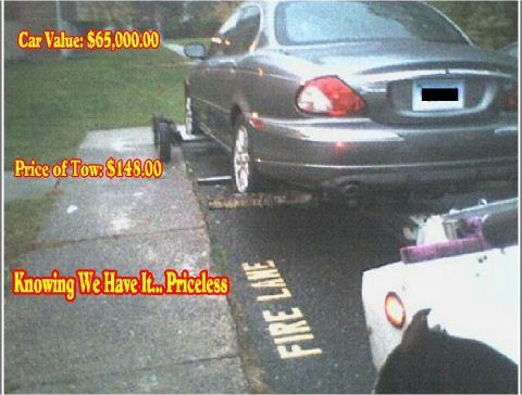 1990 Ford Bronco - Car being towed, with text overlay about value and tow cost.