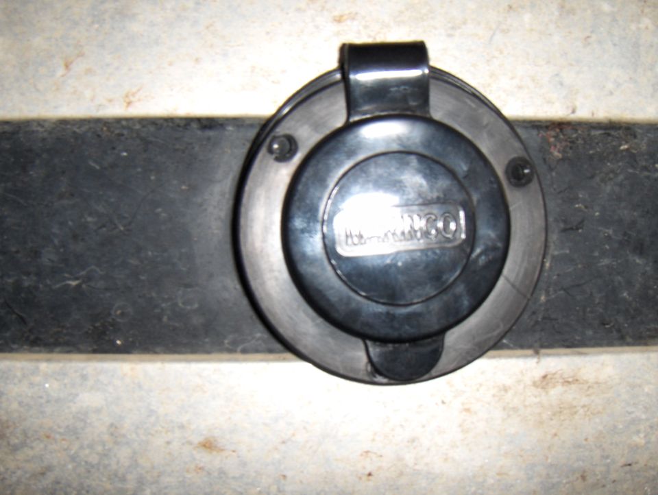 Black fuel door with 'AC DELCO' logo