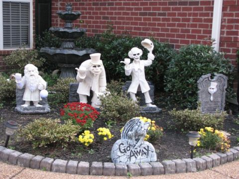 1991 Ford Bronco - A spooky graveyard scene with figures from the Haunted Mansion and a 'Go Away' sign.