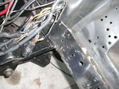 1988 Ford Bronco - Engine bay wiring harness and frame components are visible in this close-up shot.