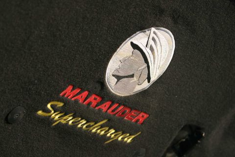 2003 Mercury Marauder - Embroidered emblem reads "Marauder Supercharged" with a Roman-style helmet graphic.