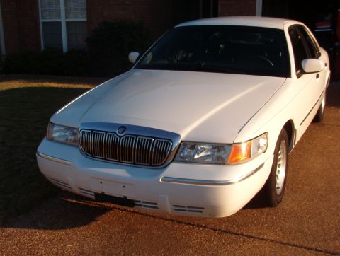 1998 Mercury Grand Marquis - At this point, I've cleaned all the glass, had it professionally washed, had the headlights polished, & had the paint touched up. It still…