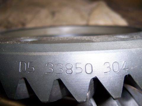1991 Ford Bronco - Close-up of a metal gear with stamped identification numbers.