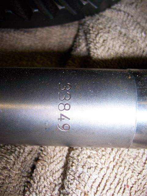 1991 Ford Bronco - A metal component is shown with the number 33849 stamped into its surface.