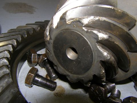 1993 Ford Bronco - Damaged differential gears and bolts are shown in this close-up view.