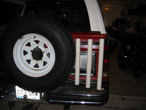 1984 Ford Bronco - Rear view of a 1984 Ford Bronco, showing the spare tire and license plate.
