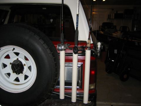 1984 Ford Bronco - Fishing rods are secured in PVC tubes mounted to the rear of a vehicle.
