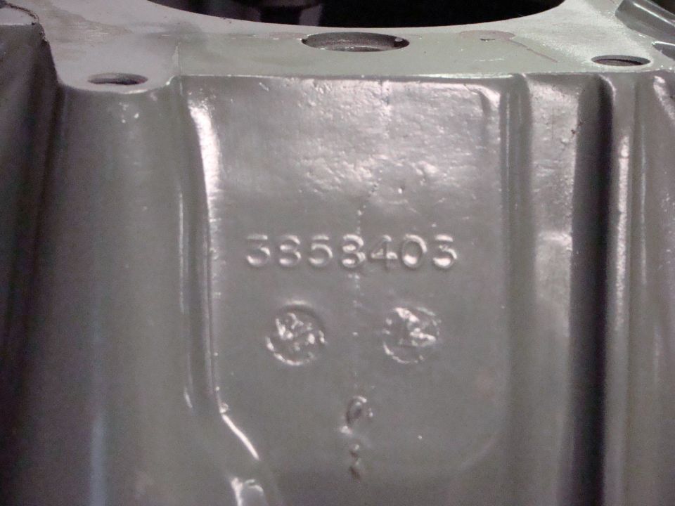Gray engine part with stamped numbers 3853405