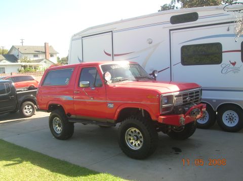 1985 Ford Bronco - This lifted Ford Bronco has aftermarket wheels and a winch on the front bumper.