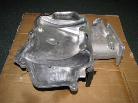 2003 Mercury Marauder - A ported and polished upper intake manifold is shown resting on a piece of cardboard. The registry claims it is from a 2003 Mercury Maraude…
