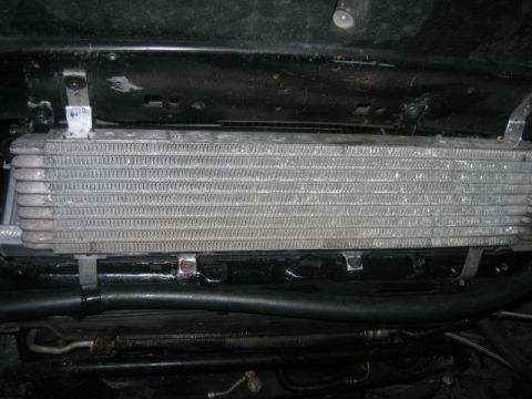1996 Ford Thunderbird - A transmission cooler is visible, mounted beneath the vehicle's chassis.