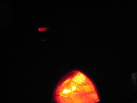 2004 Ford Crown Victoria - Nearly worthless picture... this shows how much more red the CHMSL is with LEDs versus the taillamp which used to be nearly identical in co…