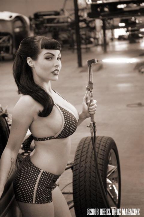 1992 Ford Bronco - A woman balances on a unicycle while holding onto the handlebars.