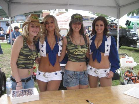 1992 Ford Bronco - Four women pose for a photo at an outdoor event, with equipment visible in the background.