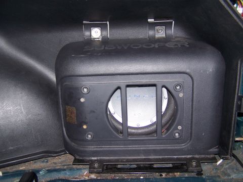 1996 Ford Probe - A subwoofer is visible, mounted in the interior of a vehicle.