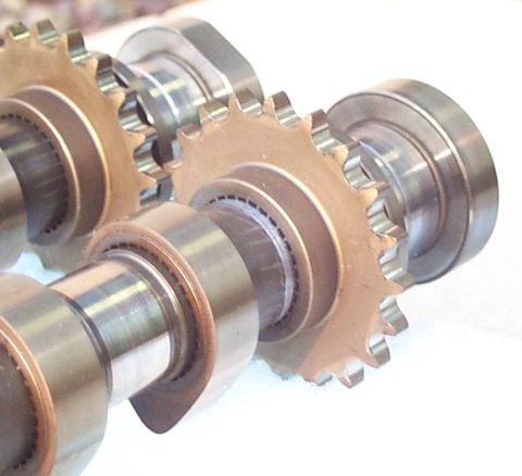 1997 Ford Taurus - Close-up view of camshafts and sprockets, with a website URL visible at the bottom right.