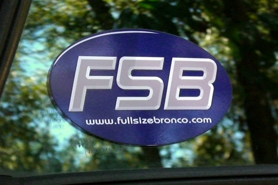 Blue oval FSB fullsizebronco.com sticker on a vehicle window