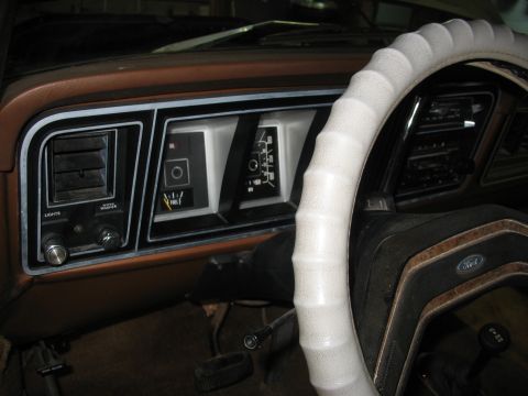 1978 Ford F-250 - The dashboard of a 1978 Ford F-250, the instrument cluster with fuel gauge and other indicators.