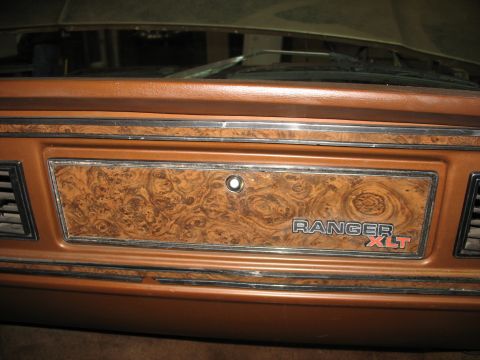 1978 Ford F-250 - Interior shot of a 1978 Ford F-250 Ranger XLT, showing the woodgrain trim panel.