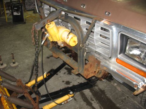 1978 Ford F-250 - A snow plow mount is attached to the front of a 1978 Ford F-250 truck.