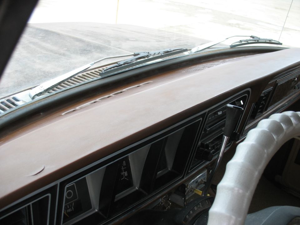 1978 Ford F-250 dashboard with brown dash pad, instrument cluster, and white steering wheel cover