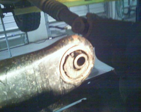 1992 Ford Bronco - Detail of a suspension part, likely from a vehicle undergoing maintenance or modification.