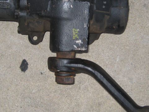 1996 Ford Bronco - A close-up view of a Ford steering gearbox component, showing mechanical details and some markings.