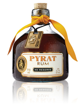 1996 Ford Bronco - A bottle of Pyrat Rum XO Reserve is displayed with a yellow ribbon and a decorative gold tag.
