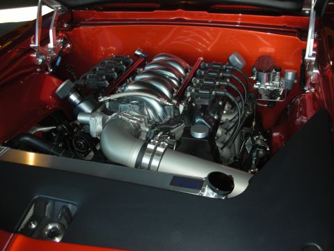 1998 Ford Crown Victoria - Custom V8 engine installed in a vehicle's engine bay, polished components.
