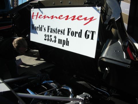 1998 Ford Crown Victoria - Photograph of a promotional sign on a Ford GT reading World's Fastest Ford GT, not a technical document.