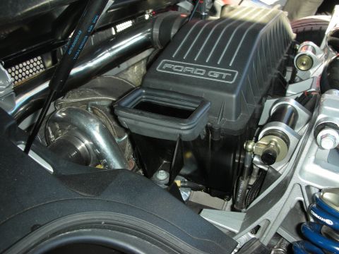 1998 Ford Crown Victoria - Close-up of the engine bay showing the Ford GT air intake and turbo components.