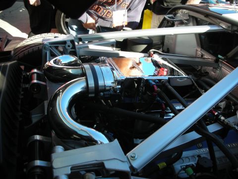 1998 Ford Crown Victoria - The engine bay features custom chrome piping and various hoses and wiring.