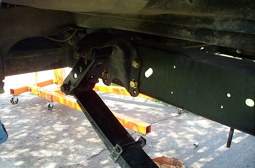 Shackle flip done.  All in all I gained 2.75 inches lift in the rear. coming to a total of 6.75" without using any rear blocks.