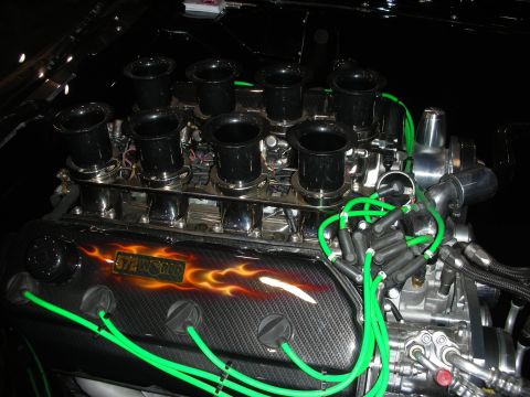 1998 Ford Crown Victoria - This V8 engine features custom flame graphics on the valve covers and bright green spark plug wires.