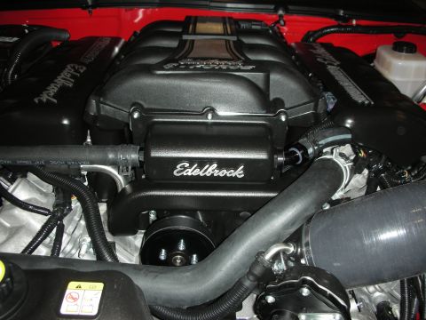 1998 Ford Crown Victoria - Engine bay features an Edelbrock supercharger and custom intake components.