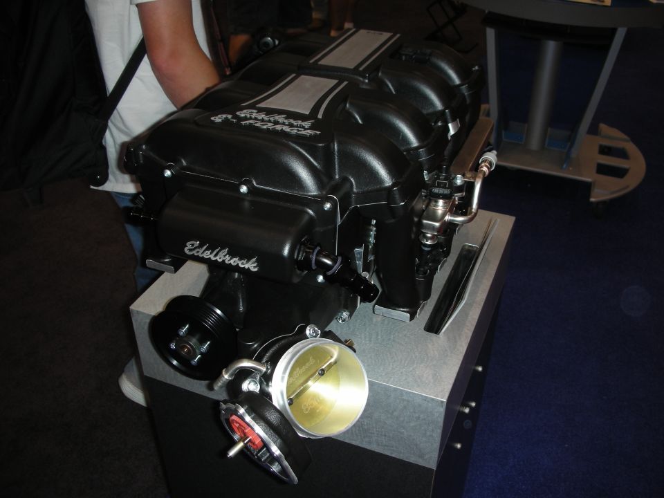 Black Edelbrock supercharger assembly with throttle body