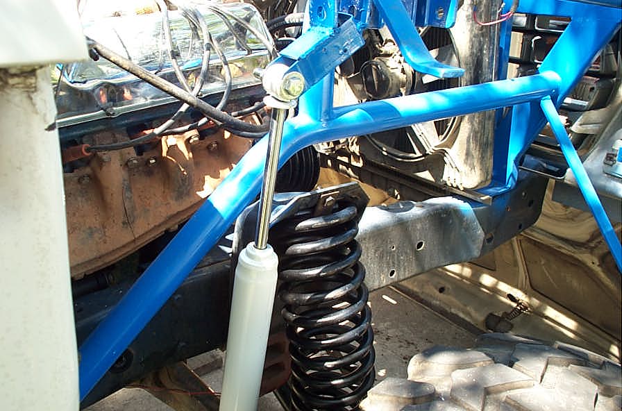 Front shocks mounted on.  7 inches up travel and 9 inches of down travel.
