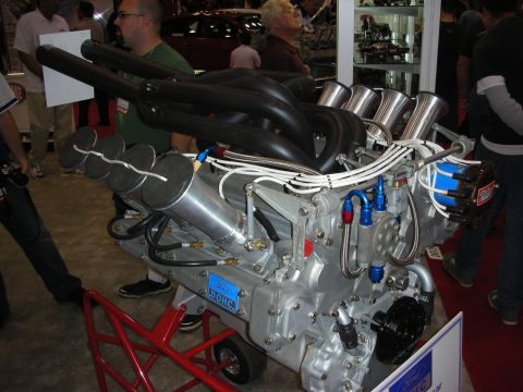 1998 Ford Crown Victoria - A custom Ford DOHC engine is displayed with elaborate exhaust and intake systems.